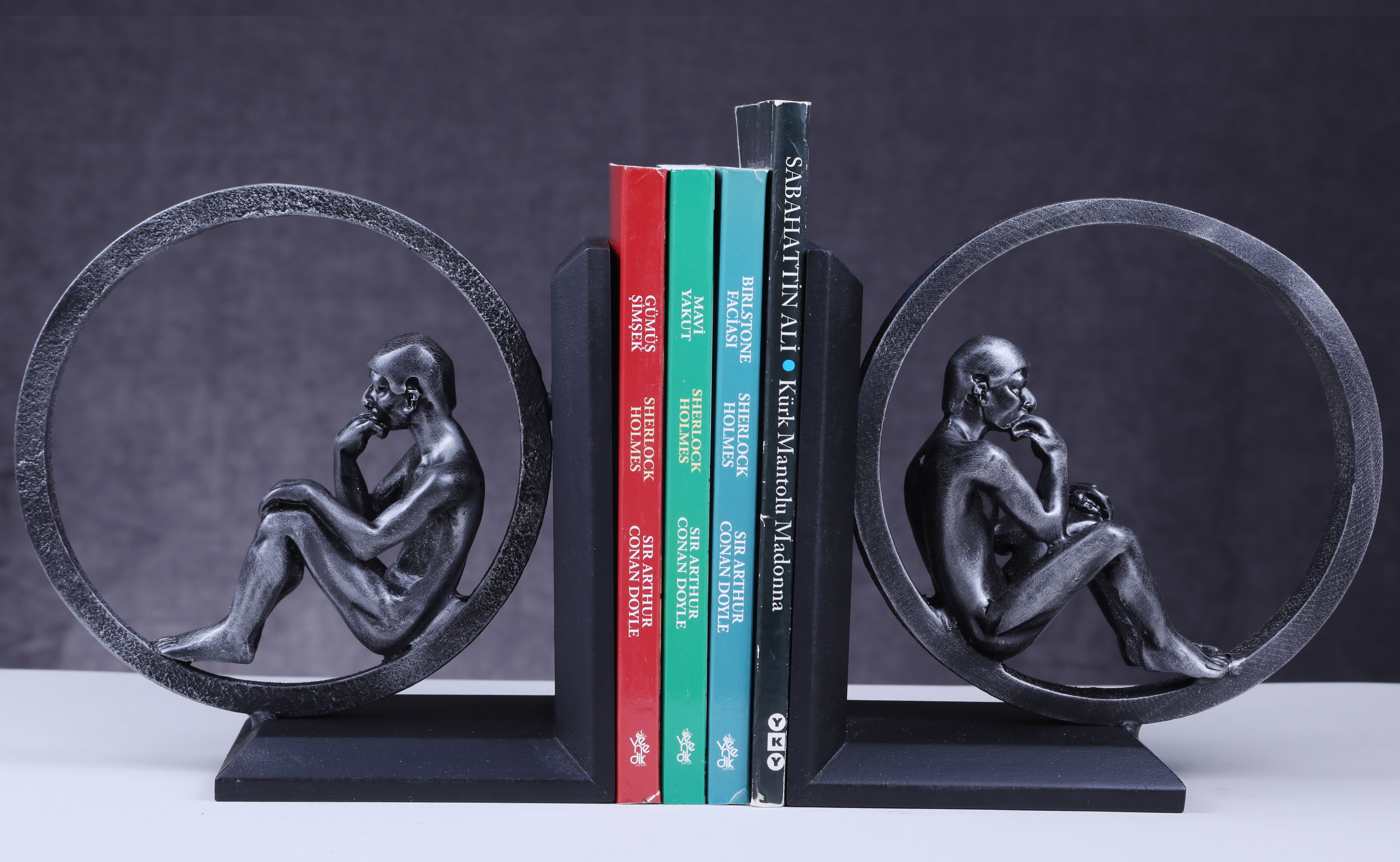 SPECIAL DESIGN BOOK HOLDER WITH THINKING HUMAN FIGURE IN RING